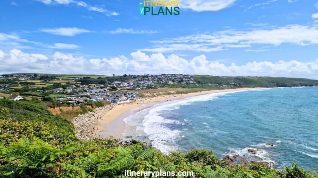 praa sands beach cornwall sandy beach and blue sky have a town