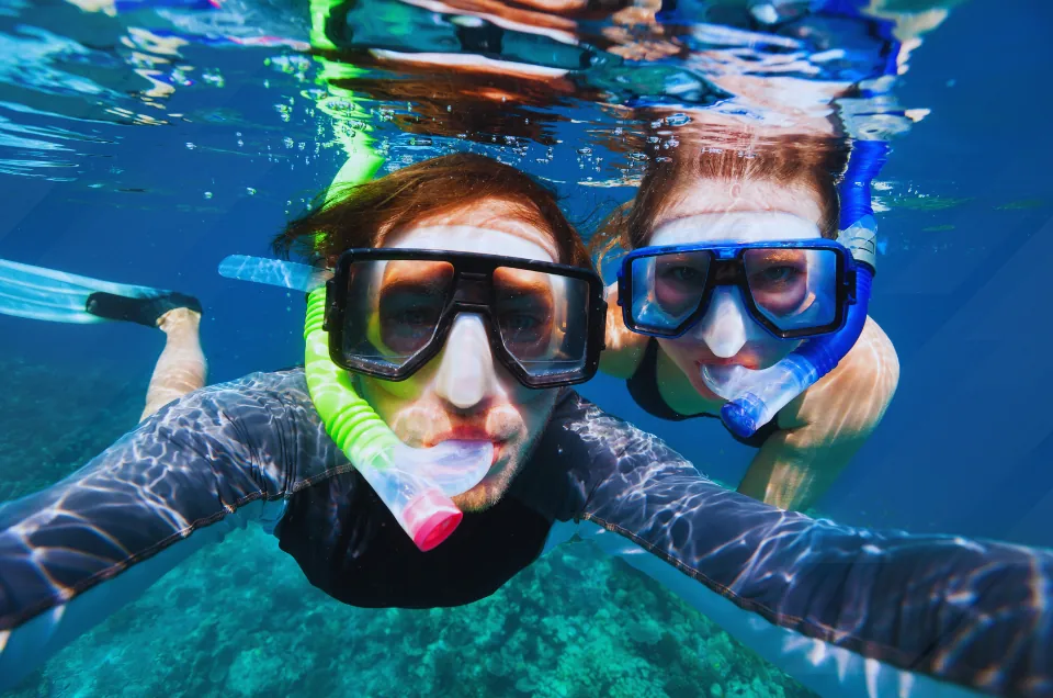 snorkeling together in honeymoon trip on maldives