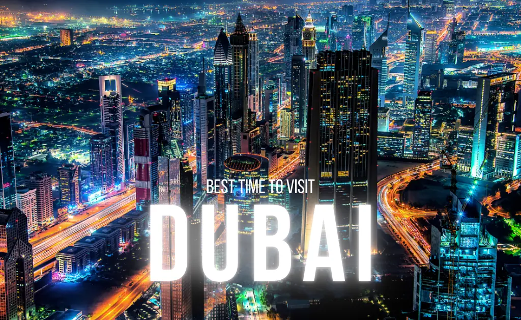 A vibrant nighttime aerial view of Dubai's illuminated skyline with towering skyscrapers, featuring bright city lights. Text overlay reads "Best Time to Visit Dubai."
